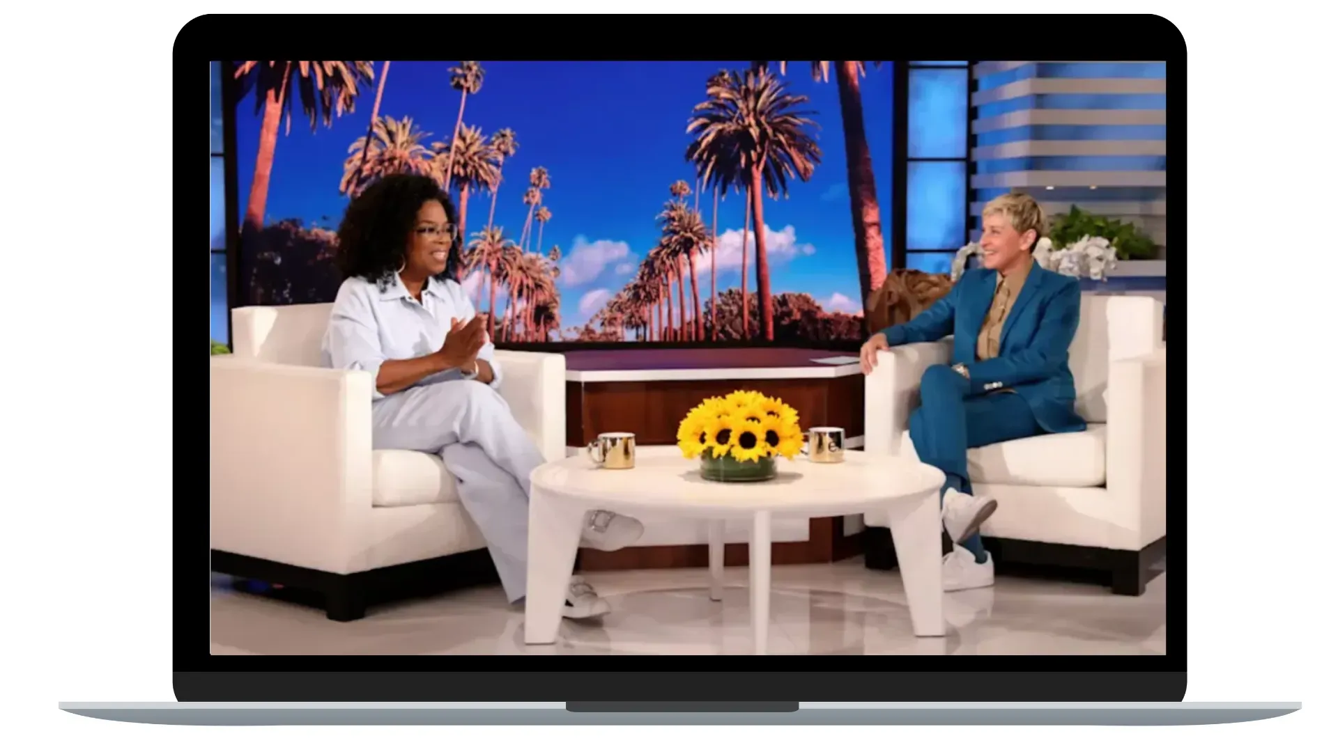 66ab07f944044a18ceea5b1b_652f95ada86e0f3e38581b06_Oprah%20winfrey%20on%20a%20talk%20show%20with%20Ellen%20DeGeneres.%20Source%20womanandhome.com.webp
